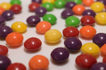 Close-up of multi-colored, round sweets.