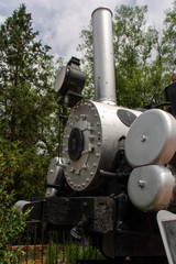 detail of Old steam train engine on display in Colorado