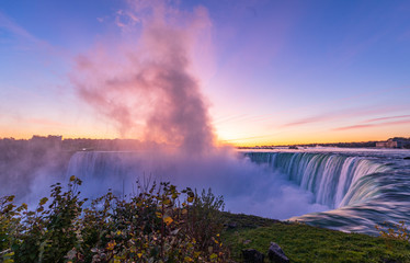 Niagara Falls is a group of three waterfalls at the southern end of Niagara Gorge, between the Canadian province of Ontario and the US state of New York