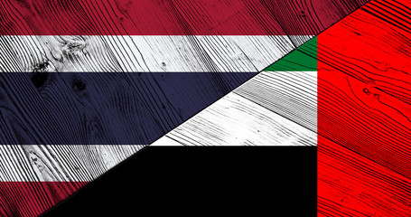 Flag of Thailand and the United Arab Emirates on wooden boards