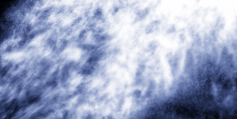 A stream of water and a cloud of drops