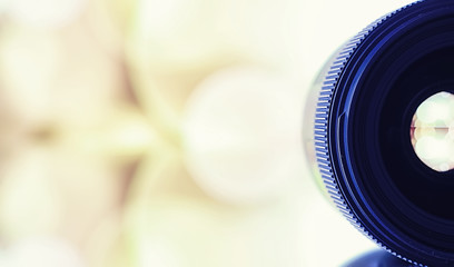 Equipment videographer and photographer. Lenses on the table against the background of bright...