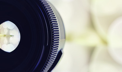 Equipment videographer and photographer. Lenses on the table against the background of bright...