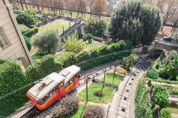 Red funicular in the old city of Bergamo
