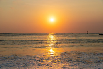 Beautiful sunset scenery at Jimbaran beach, Bali island, Indonesia.