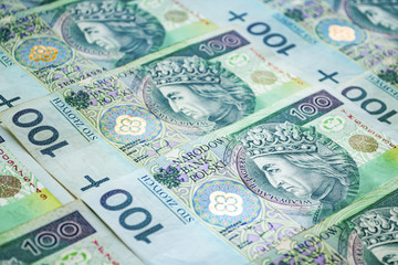 Fototapeta na wymiar One hundred polish zloty banknotes background. Finance, Business