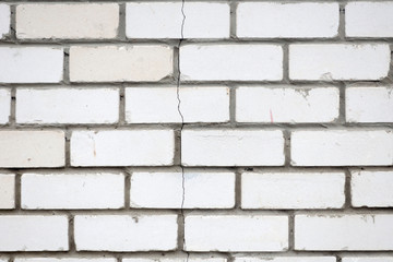 The crack in the brick wall. Stone