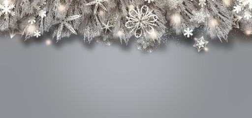 christmas decoration on silver background and place for text