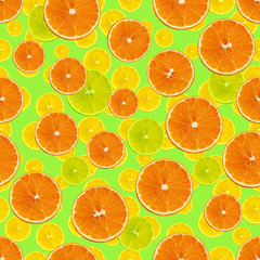 set seamless texture with juicy slices of orange, lemon, lime on a green background for a menu or recipe, concept of vegetarian, vitamin and wholesome food, background, pattern for textile, wallpaper