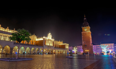 Colorful Christmas Krakow. Old Market Square and City Hall Tower