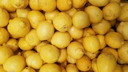 A pile of lemons in market
