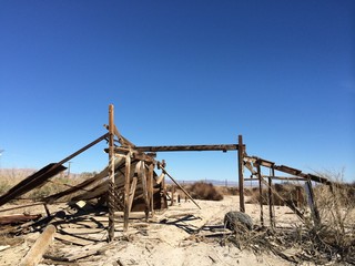 Abandoned ruins of a building frame and window at Bombay Beach resort in Southern California near the Salton Sea