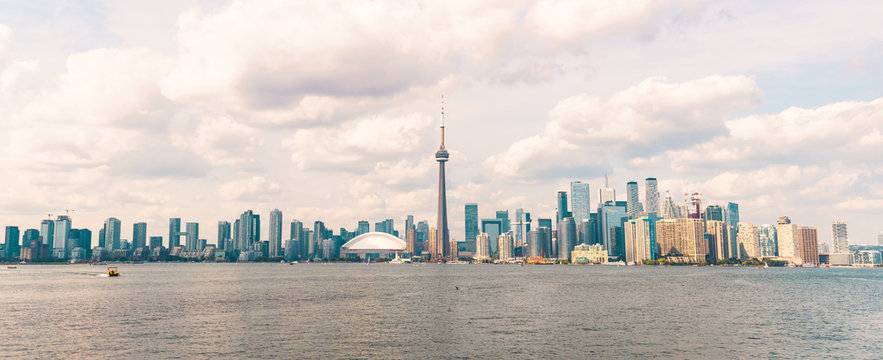 Panoramic view of Pink Cloudy Toronto City Skyline with Waterfront
