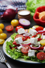 A plate full of bright fresh vegetable salad