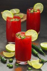Jalapeno tomato margarita cocktail with lime