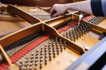 Piano tuning sound before jazz concert