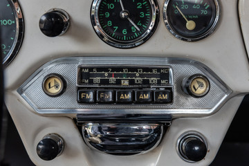 European engineering in classic cars had a much simpler dashboard with only knobs and buttons for simple functions.