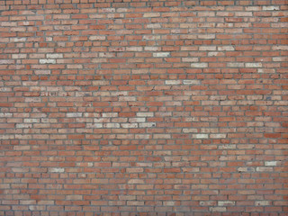 wall texture with lots of brown and red bricks