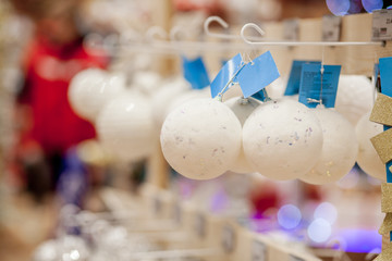 Christmas toy on the Christmas tree. New Year decoration. Decorated shop window