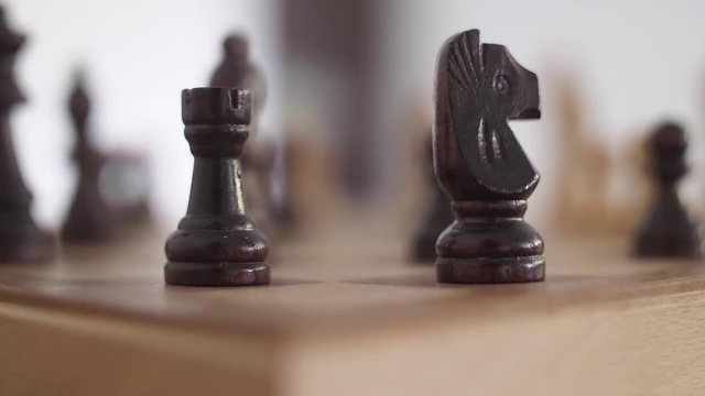 wooden chess pieces in chess board game 4k