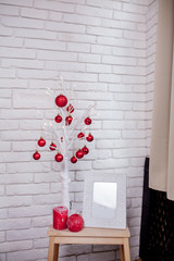 Beautiful decorative white branches with Christmas toys for Valentine's day, copy space
