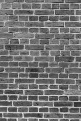 Dekorative alte Backsteinmauer in schwarz weiss