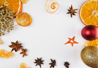      Christmas background isolated on white background. orange, christmas toys, star anise      