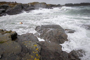 stiff breeze and the waves hit the rock.j