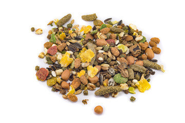 a variety of nutritious, balanced granulated food for rodents isolated on white background