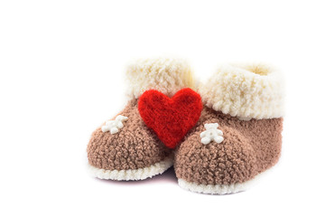 knitted baby booties for newborn isolated on white background