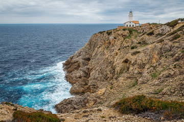 Fototapeta na wymiar Leuchtturm von Cala Ratjada auf Mallorca
