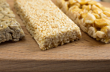 sugar glazed kozinak, sunflower seeds and peanuts in sugar glaze, Oriental sweets close-up macro, brittles