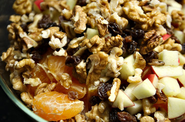 fruit salad with walnuts close-up