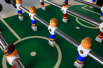 Fototapeta premium dolls of a retro foosball table to play table football