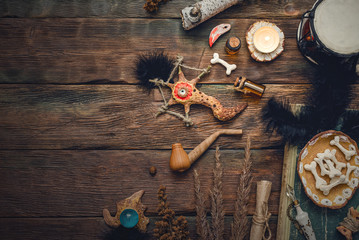 Witchcraft table. Witch doctor. Shamanic accessories. Old magic book.