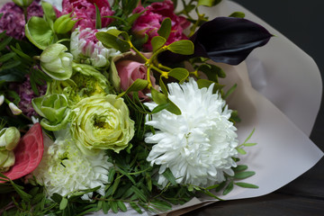 Detail closeup of Christmas and New Year composition bouquet on a dark background, selective focus