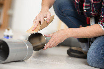 sandpaper on stainless pipe