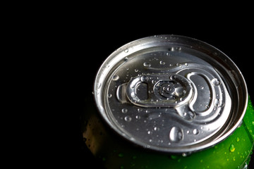 aluminum soda and beer beverage can with water droplets isolated on dark background, metal can, recyclable product