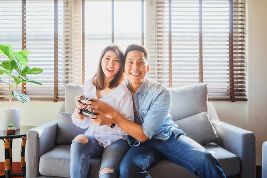 Couple playing video game together