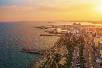 Limassol, Cyprus aerial panoramic view at sunset. Evening mediterranean resort town or city with...