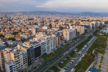 Fototapeta premium Limassol, Republic of Cyprus, aerial cityscape. Many buildings of resort town, drone photo.