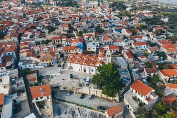 Fototapeta na wymiar Aerial view of famous landmark valley Pano Lefkara village, Larnaca, Cyprus with orange ceramic roofs, drone photo.