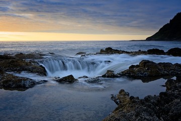 Fototapeta na wymiar Dramatic sunset Thor's Well Cape Perpetua Oregon Coast