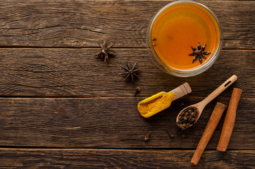 Fototapeta na wymiar turmeric tea with spice tea top