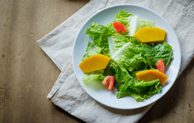 Mix salad vegetable  in white dish,vegan