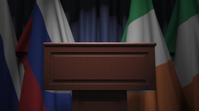 Flags of Ireland and Russia at international meeting, 3D animation