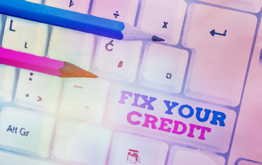 Writing note showing Fix Your Credit. Business concept for Keep balances low on credit cards and...