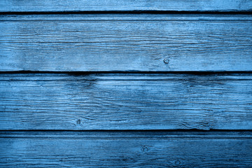 The old blue wood texture with natural patterns. Color of the year 2020 classic blue toned