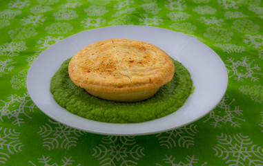 Beef pie with mushy peas