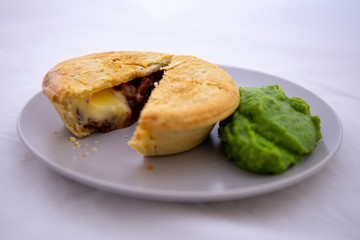 Beef pie with mushy peas